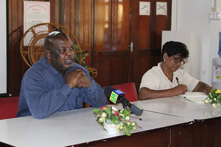 Chief Executive Officer Albert Gordon, seated next to Regional Vice-Chairperson Juliet Coonjah, during a meeting with members of the Region Two Regional Democratic Council yesterday. (Department of Public Information photo)
