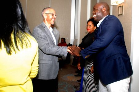 Minister of Business Dominic Gaskin (centre) and GTT Chief Executive Officer Justin Nedd at a Guytie sponsors’ event at the Marriott Hotel on Wednesday