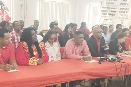 Some of the PPP/C’s candidates at Freedom House on Monday with Opposition Leader Bharrat Jagdeo (seventh, from left) and other officials.

