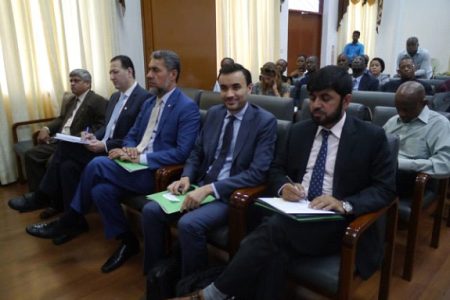 Executives of the IsDB, (from right to left)  Saifullah Abid, Senior Country Programme Manager; Anise Terai; Vice President, Sayed Aqa and Special Advisor to the Vice President, Mohammad Alsaati, seated with Junior Finance Minister Jaipaul Sharma during their visit here in 2016. 