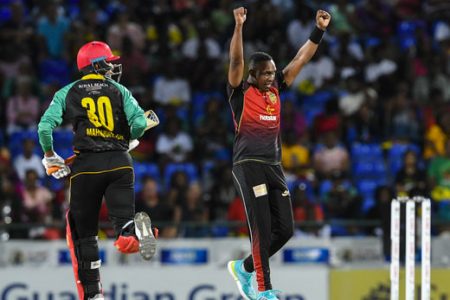 Dwayne Bravo (R) of Trinbago Knight Riders celebrates winning match 23 of the Hero Caribbean Premier League between St Kitts & Nevis Patriots and Trinbago Knight Riders at the Warner Park Sporting Complex on Sunday in Basseterre, St Kitts, Saint Kitts And Nevis. (Photo by Randy Brooks - CPL T20/Getty Images)
