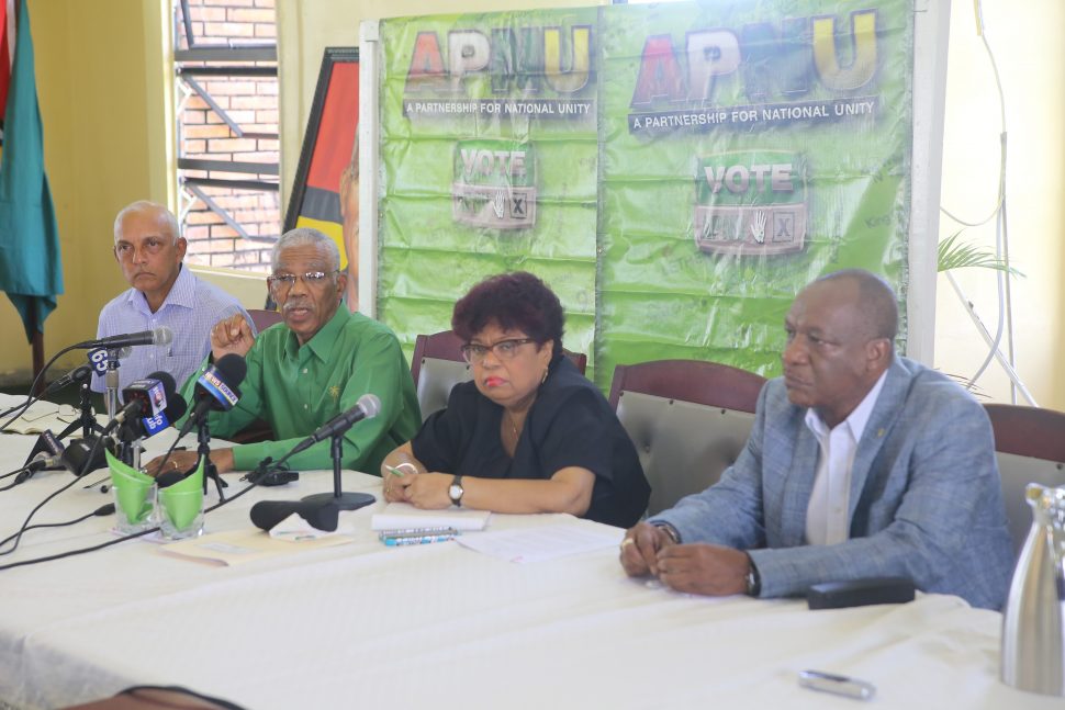 President David Granger speaks at the launching of the local government elections campaign for A Partnership for National Unity (APNU). Supporting him are (from left) Minister of Communities Ronald Bulkan, APNU Campaign Manager Amna Ally and APNU General Secretary Joseph Harmon. (Photo by Terrence Thompson)