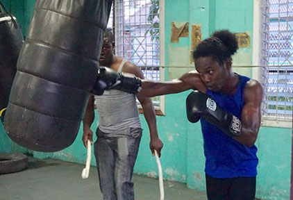 Delon Charles was spotted going through his paces under the watchful eyes of former world rated boxer, Clive Atwell at the Ricola Boxing Gym yesterday.