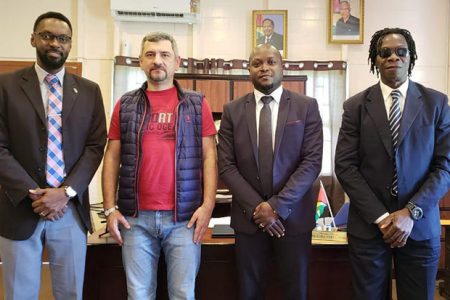 Chess Grandmaster Viktor Bologan from Moldova is flanked by President of the Guyana Chess Federation (GCF) James Bond on the right and Director of Sport Christopher Jones. At extreme right is Vice-President of the GCF Frankie Farley. Bologan paid a visit to Guyana last week following discussions with Bond in relation to the upliftment of chess in Guyana. 