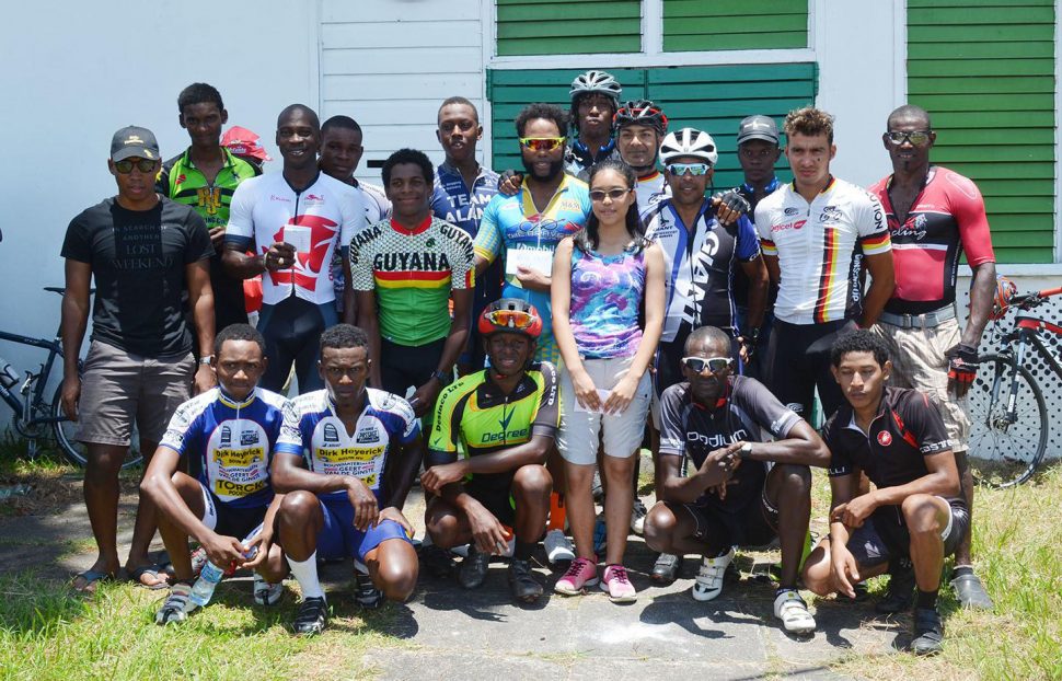 The top prize takers pose for a photo following the completion of the race yesterday on Homestretch Avenue. (Orlando Charles photo)
