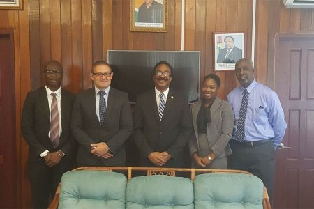 British anti-corruption advisor David Robinson (second, from left) with Sydney James, Head of SOCU (at left), Attorney General, Basil Williams, Joann Bond, Deputy Chief Parliamentary Counsel and Matthew Langevine, Director of the Financial Intelligence Unit, after a meeting last September. (Ministry of Legal Affairs photo)
