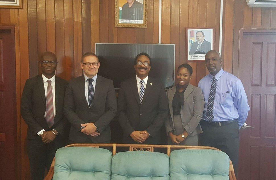 British anti-corruption advisor David Robinson (second, from left) with Sydney James, Head of SOCU (at left), Attorney General, Basil Williams, Joann Bond, Deputy Chief Parliamentary Counsel and Matthew Langevine, Director of the Financial Intelligence Unit, after a meeting last September. (Ministry of Legal Affairs photo)
