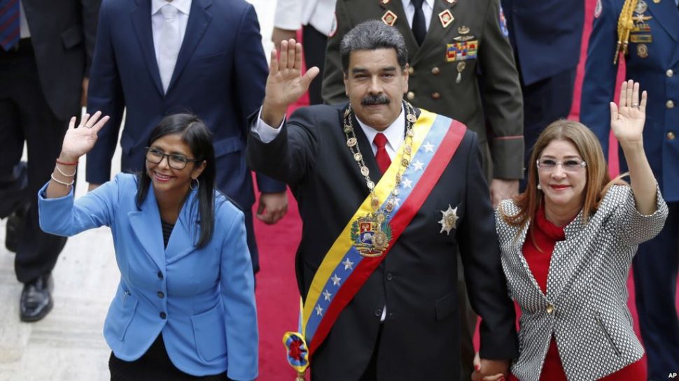 Venezuela’s President Nicolas Maduro, then Constituent National Assembly President Delcy Rodriguez, left, and first lady Cilia Flores, wave as they arrive to the National Assembly, in Caracas, Venezuela, May 24, 2018. The Trump administration slapped financial sanctions Tuesday, Sept. 25, 2018, on four members of Maduro’s inner circle, including his wife, and Rodriguez who is now the nation’s vice president, on allegations of corruption.