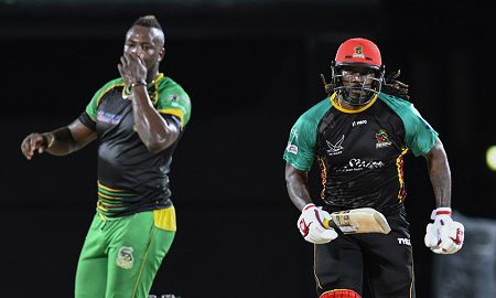 Andre Russell (left) and Chris Gayle compete against each other during the ongoing Caribbean Premier League.
