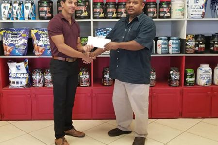 CEO of the leading local supplement and gym equipment supplier, Jamie McDonald recently presented a sponsorship cheque to Treasurer of the Guyana Amateur Powerlifting Federation (GAPF), Colin Austin to shoulder the load of the fixture.
