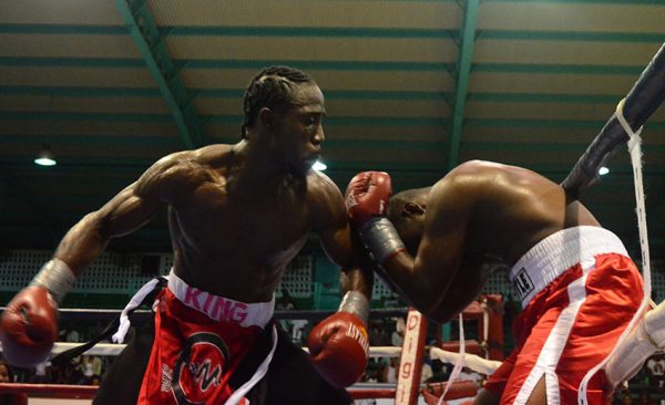 Keithland King sporting cornrows, had the much bigger Richmond going all the way back, using his superior skill and motor fitness to land effectively and efficiently while evading his opponent’s punches. (Orlando Charles photo)