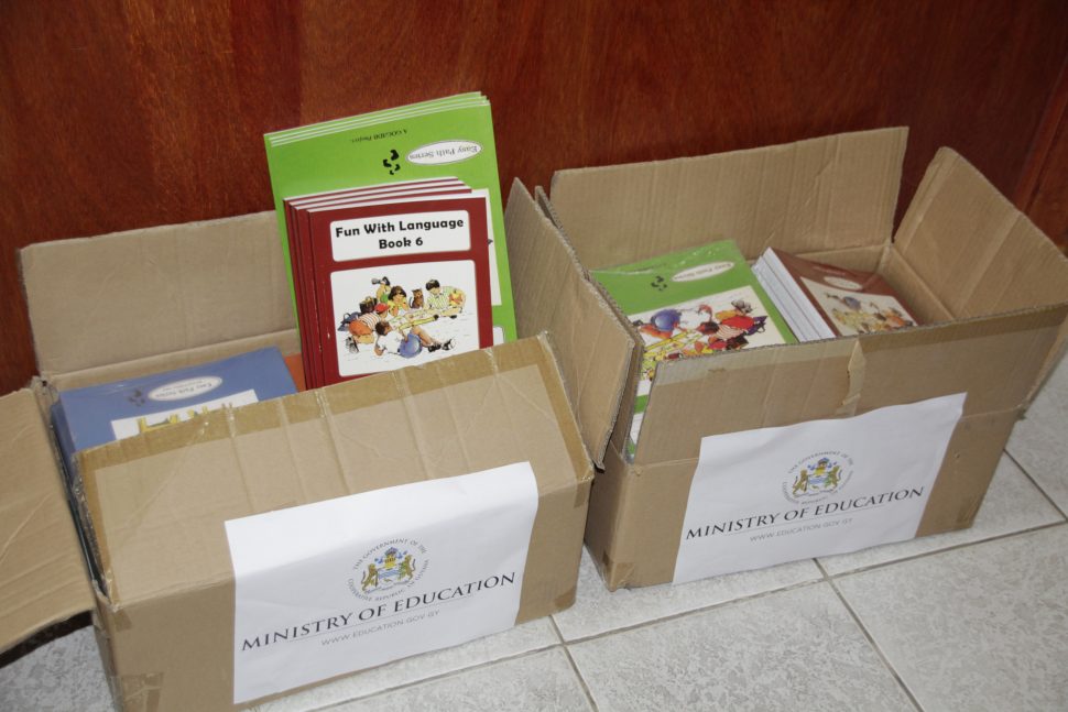 The textbooks packaged and ready to be shipped to the students of Kopinang Primary School. (Ministry of Education photo) 


