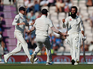 England’s Moeen Ali celebrates taking the wicket of India’s Ajinkya Rahane. Reuters/Paul Childs
