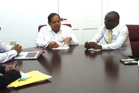 Prime Minister Moses Nagamootoo is at centre. Sherod Duncan is at right. (Office of the Prime Minister photo)