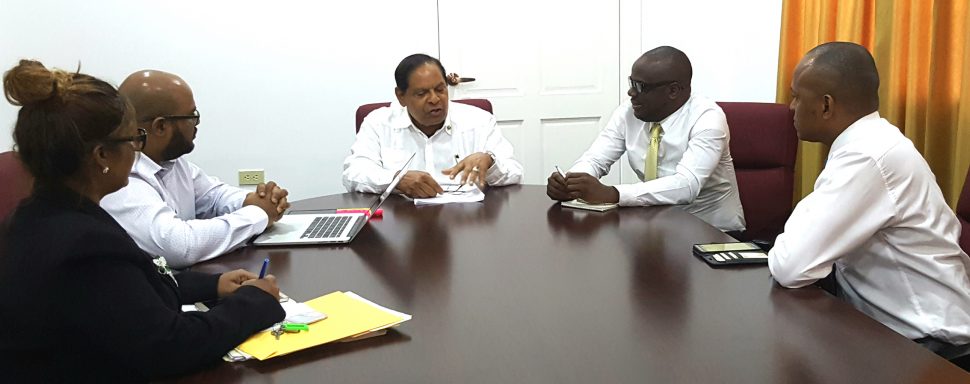 Prime Minister Moses Nagamootoo is at centre. Sherod Duncan is at right. (Office of the Prime Minister photo)