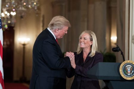 President Trump congratulates Kirstjen Nielsen, the newly confirmed Homeland Security secretary, during a White House ceremony in October to announce her nomination. MUST CREDIT: Washington Post photo by Jabin Botsford