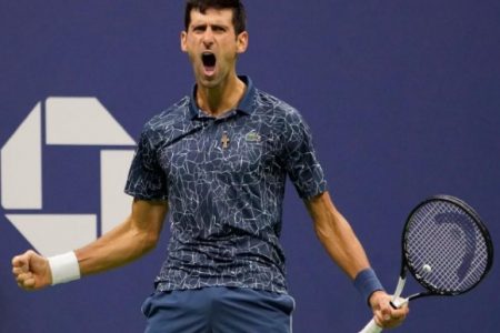 Novak Djokovic of Serbia celebrates a service break in the 3rd set against Juan Martin del Potro of Argentina in the men’s final yesterday.