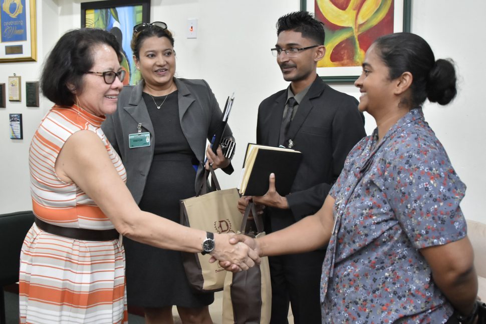 First Lady,  Sandra Granger (left) greets Director of Demerara Bakery,  Sharmella Chan- Abai. Also in photo are CEO of the Bakery  Marissa DaCosta – Thakurdin (second left), and Human Resource and Marketing Manager, Davindra Lalltoo (second right). 
 

