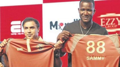 Darren Sammy (right) and Robin Singh will be teaming up in the T10 League
