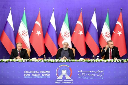 President Vladimir Putin of Russia, Hassan Rouhani of Iran and Tayyip Erdogan of Turkey attend a news conference following their meeting in Tehran, Iran September 7, 2018. Kirill Kudryavtsev/Pool via REUTERS