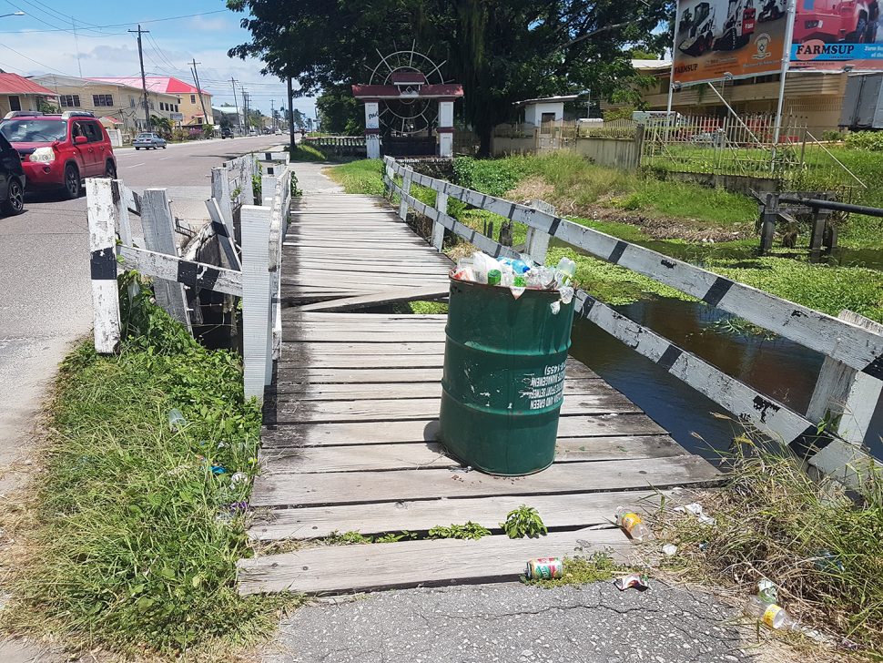 Watch your step: The footbridge along Camp Street near the junction with Lamaha Street is in need of repair. (Photo by Terrence Thompson) 