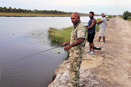 Overseas-based Guyanese spending the afternoon fishing
