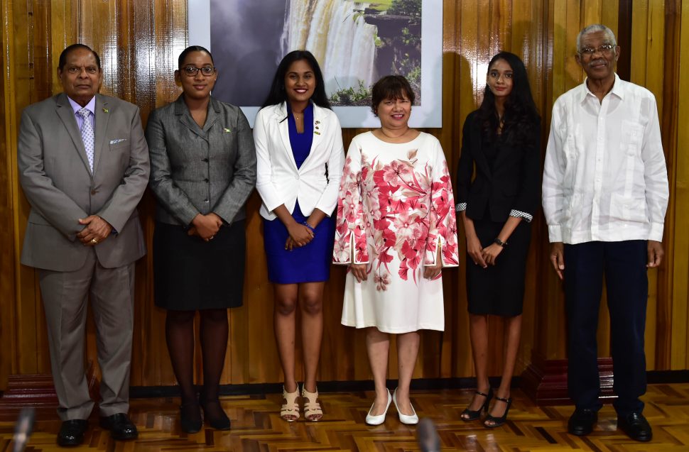 Prime Minister Moses Nagamootoo, Prime Minister for the Day Delicia George, Canadian High Commissioner for the Day Sara Mohan, Canadian High Commissioner to Guyana Lilian Chatterjee, President for the Day Renuka Persaud and President David Granger at the Ministry of the Presidency. (Ministry of the Presidency photo)