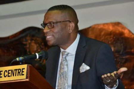 Dr Asburn Pinnock, president of The Mico University College, speaking yesterday at Mico’s Child Assessment and Research in Education Centre’s Seventh Biennial Education Conference opening ceremony at the Jamaica Conference Centre.
