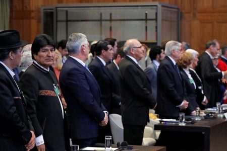 Bolivian President Evo Morales (second from left) is seen at the International Court of Justice, the U.N.’s highest court for disputes between states, before the ruling on a dispute between Bolivia and neighbour Chile on access to the Pacific Ocean, in The Hague, the Netherlands (REUTERS/Yves Herman)