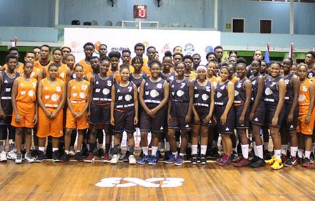 Nigel Hinds, President of the GABF, poses for a photo with the different teams during the opening ceremony of the IBF Under-18 Antilles 3×3 Championships yesterday at the Cliff Anderson Sports Hall.
