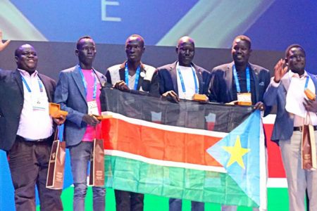 The South Sudan team that won the top prize in the E-category Open Section for Men at the 43rd Chess Olympiad in Batumi, Georgia. 