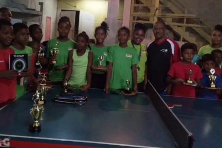 Participants of the East Bank Children’s Cup 2018 along with Michael Clark and Priscilla Greaves at the end of the tournament on Monday.
