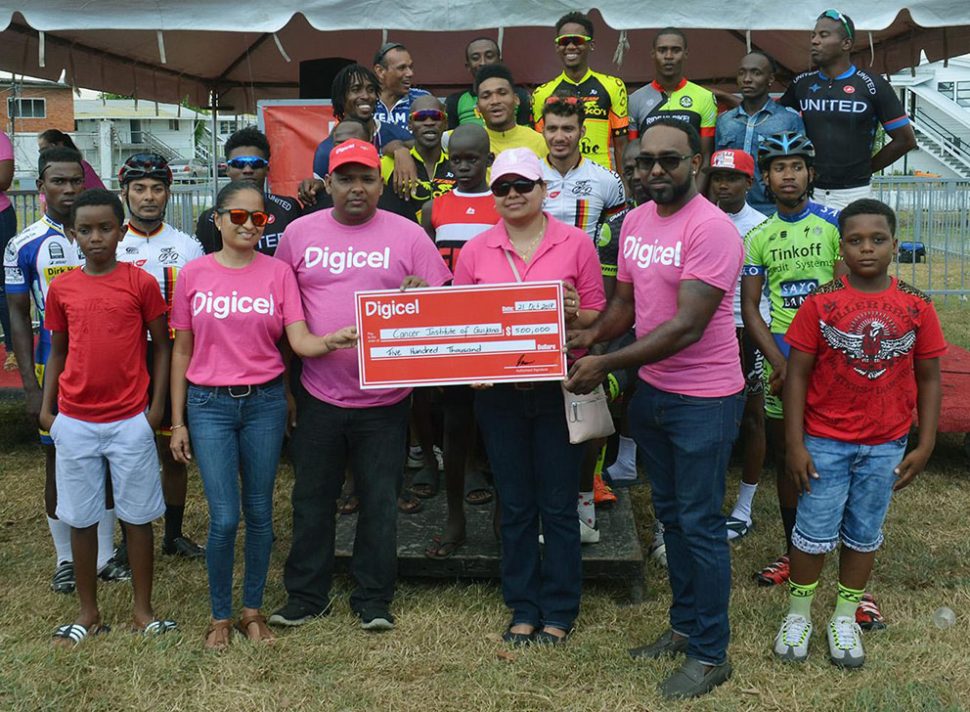 The top prize winners along with representatives of Digicel and the Guyana Cancer Institute pose for a photo opportunity yesterday following the seventh Digicel Cycling event staged on the circuit outside the GDF compound on Irving Street and Vlissingen Road. (Orlando Charles photo)
