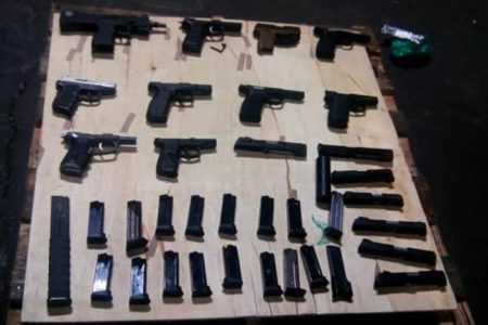 A part of the cache of weapons and ammunition seized at the port in Kingston. (Photo. Jamaica Gleaner)
