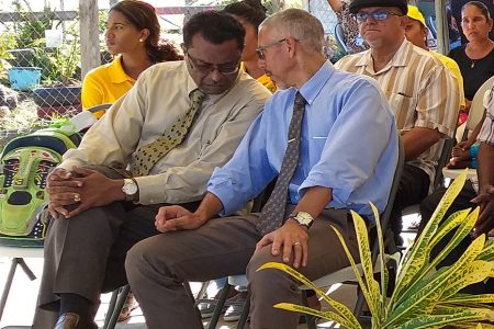 In front row from left to right are Minister of Public Security, Khemraj Ramjattan and Minister of Business, Dominic Gaskin.