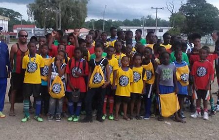  Young aspiring footballers who participated in a soccer camp at the Scot’s School Ground, Esplanade Road, New Amsterdam yesterday. The camp was conducted by former national footballer Roger Alphonso.
