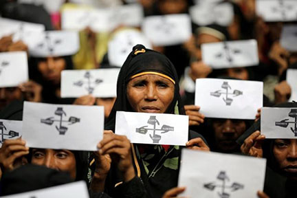 Rohingya refugee women hold placards as they take part in a protest at the Kutupalong refugee camp to mark the first anniversary of their exodus in Cox’s Bazar, Bangladesh, August 25, 2018. (Reuters photo)