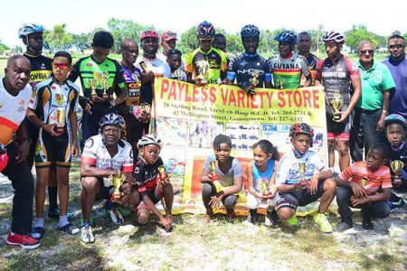 Flashback! Prize winners of the various categories of the 6th Annual Payless Variety Store-sponsored 11-race cycle programme along with race organiser Hassan Mohammed (third from right), Rajin Tiwari of Payless Variety Store (second from right) and race official Joseph Briton (extreme left)
