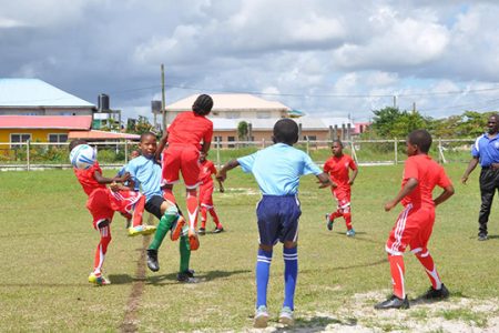 Scenes from the Agricola Red Triangle (red) and Samatta Point/Kaneville clash in the East Bank Football Association [EBFA]/Ralph Green Under-11 League
