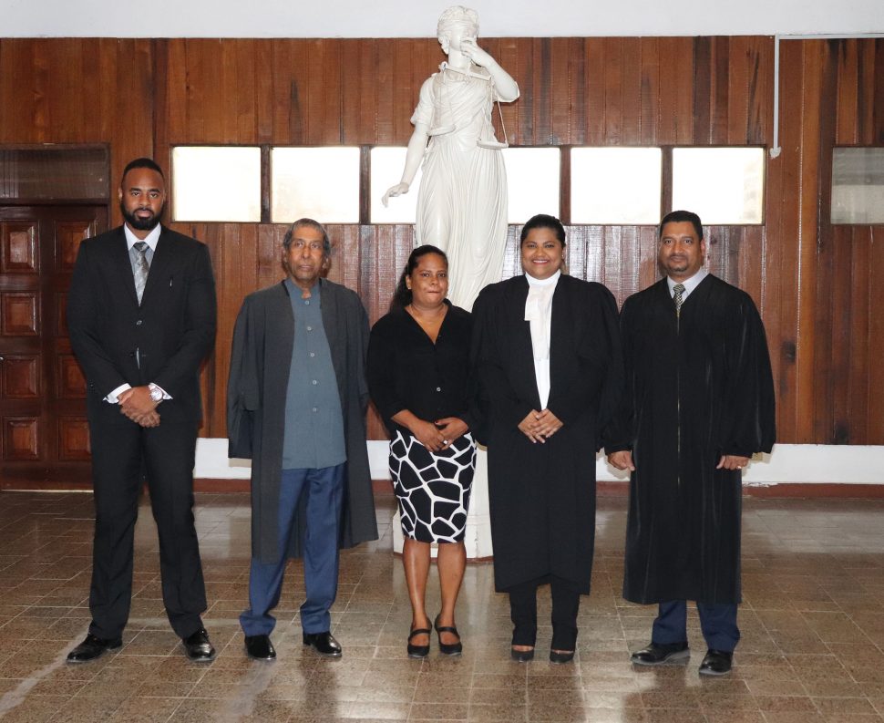 From left to right are Magistrate Alex Moore, Murseline Bacchus, Petal Sabsook, Surihya Sabsook and Justice Navindra Singh