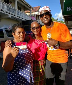 Former West Indies Test captain Darren Sammy poses with the fans at the launch of over-the-counter ticket sales in St Lucia.