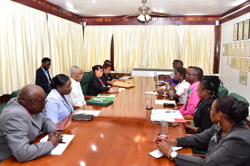 President David Granger with Ministry of Education officials (at left) during the meeting with executive members of the Guyana Teachers’ Union at State House this morning