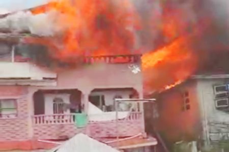 The three-storey building on fire 