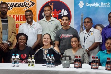 The sponsors and the organizers of the fourth annual Guyana Fitness Games’ Health and Fitness Expo pose for a photo Tuesday night following the launch at the Genesis Fitness Express Gym. The two-day event will be held at the Cliff Anderson Sports Hall starting Saturday. 
