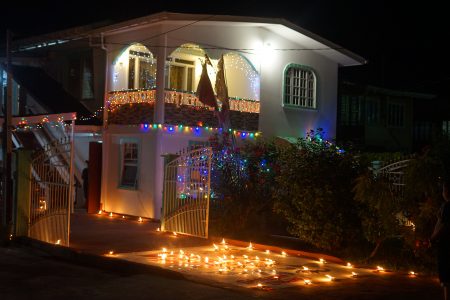 A family in Campbellville decorated the driveway of their home with diyas, which were lined alongside the rangoli designs on the driveway.