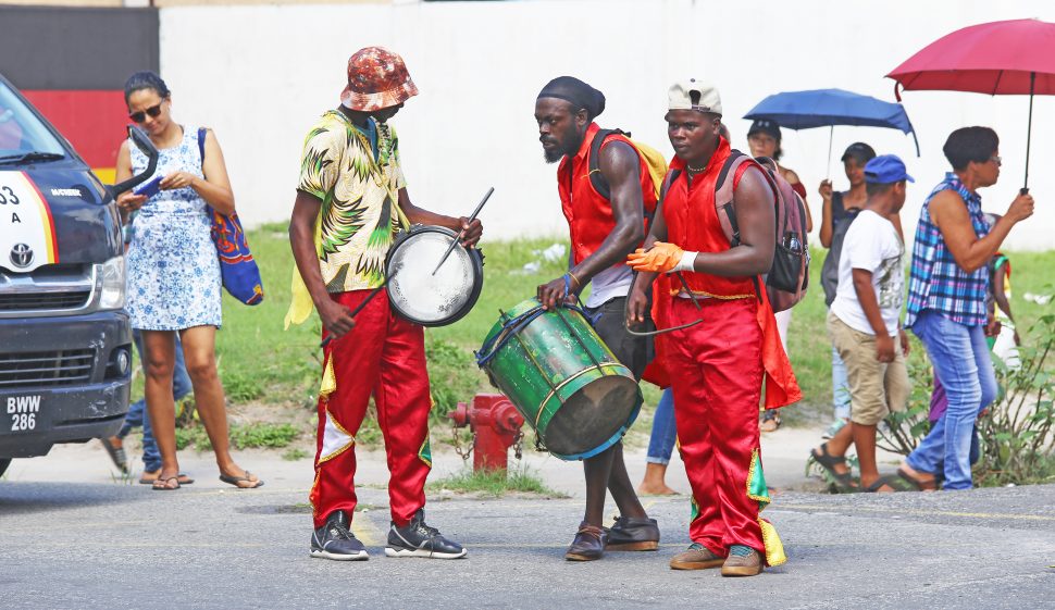 Masquerade band drummers during a performance at Robb and Wellington streets yesterday. (Photo by Terrence Thompson)
