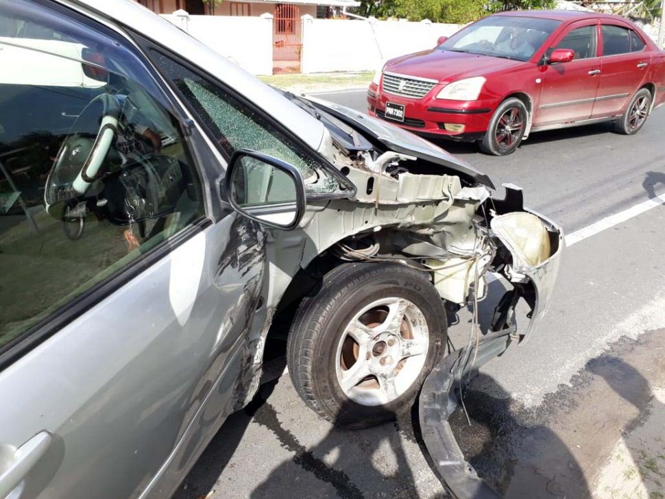 Damage to the body of the car resulting from the collision with the pick-up. 