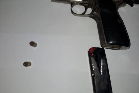The illegal pistol and ammunition which were discovered by police on Monday morning.
