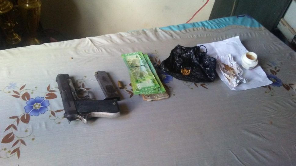 The items along with the unlicensed gun and ammunition that were recovered by the police. (Guyana Police Force Photo)