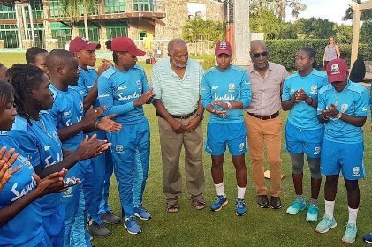 Sir Vivian Richards (third from right) has the attention of the West Indies Women during a training session. CWI ambassador, Sir Andy Roberts (fifth from right) is also present. (Photo courtesy CWI Media) 